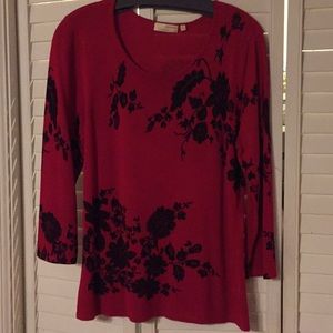 Black and red sweater.